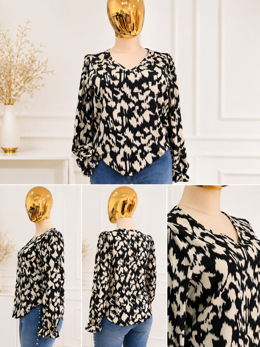 BLUSA ANIMAL PRINT MANGA LARGA