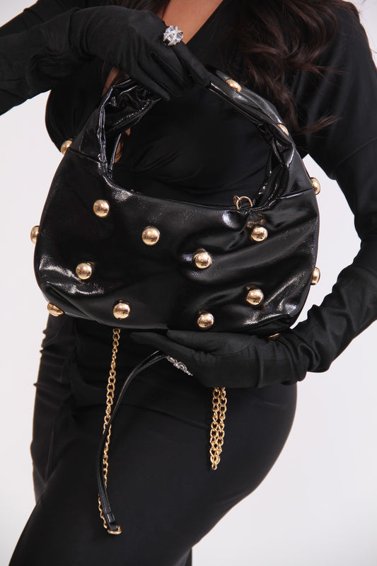 BOLSO NEGRO PELAS GRANDES DORADAS