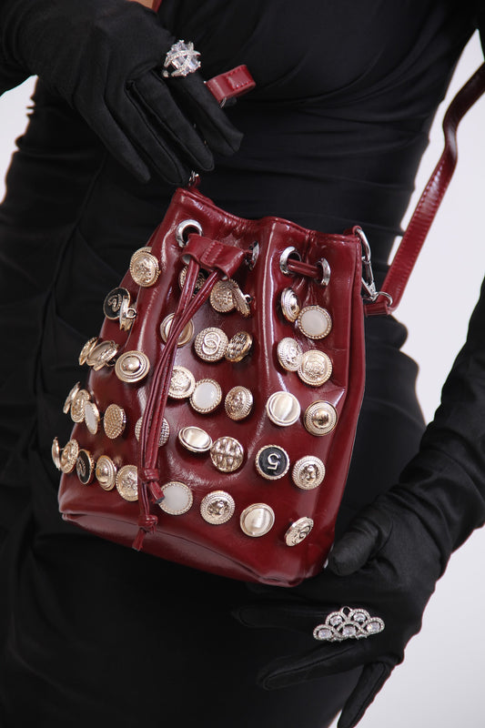 BOLSO TINTO DIJES REDONDOS